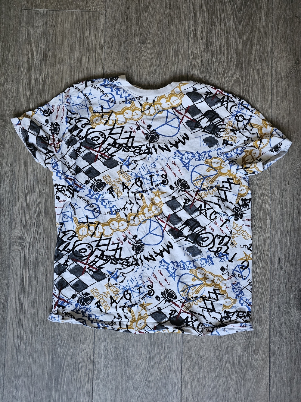Rue21 White Short Sleeve Tee with Black, Blue & Gold Graphic Print